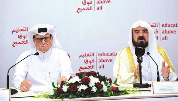 Mohamed al-Naama and Prof Dr Ali M al-Quradaghi announcing EAAu2019s fundraising campaign yesterday. PICTURE: Nasar T K