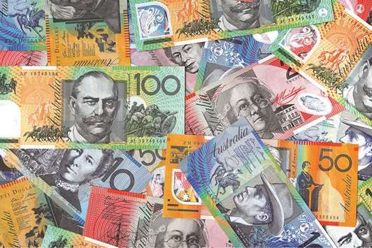 Bank of America Merrill Lynch reckons the Australian dollar will rise to 77 US cents by year end driven by higher local interest rates, but Goldman Sachs Asset Management says the currency is heading south with the central bank on hold
