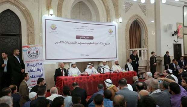 Officials and dignitaries are seen during the inauguration ceremony of the mosque in Gaza Strip.