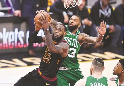 LeBron James of the Cleveland Cavaliers drives to the basket against Marcus Morris of the Boston Celtics in the second-half during game four of the 2018 NBA Eastern Conference Finals at Quicken Loans Arena in Cleveland, Ohio. (Getty Images/AFP)