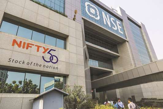 Employees enter the National Stock Exchange of India building in Mumbai (file). The NSE sued Singapore Exchange in a Mumbai court, escalating a dispute that threatens to leave international investors without one of the worldu2019s most widely used offshore futures contracts.