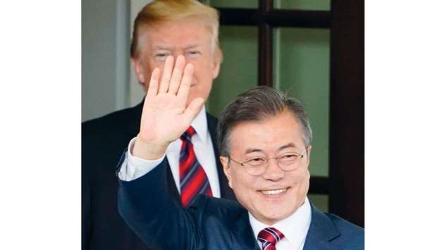 US President Donald Trump greets South Koreau2019s President Moon Jae-in upon his arrival at White House yesterday in Washington, DC.