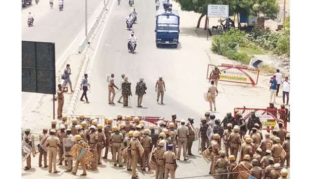 Police personnel are deployed during a demonstration to press for the closure of  Vedantau2019s Sterlite copper smelter in Tamil Naduu2019s Thoothukudi district yesterday.