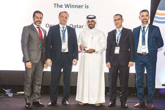 Sheikh Nasser joins Cisco Middle East West Region general manager Hani Raad and other Cisco executives during the award ceremony.