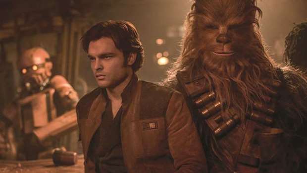 ACTION: Alden Ehrenreich as Han Solo, with Chewbacca (Joonas Suotamo), in Solo: A Star Wars Story.