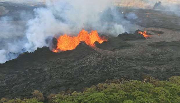 A US Geological Survey handout photo of the fissure complex as it remains active in Kilauea Volcanou2019s lower East Rift Zone.