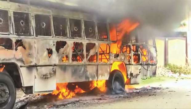 A bus burns during a protest against the construction of a copper smelter by Vedanta Resources in Thoothukudi, Tamil Nadu.