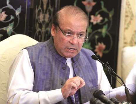 Nawaz Sharif gestures during a news conference in Islamabad yesterday.