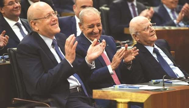 Lebanonu2019s parliamentary re-elected speaker Nabih Berri gestures as the newly-elected parliament convenes for the first time in Beirut, yesterday.