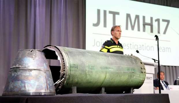 A damaged missile is displayed during a news conference by members of the Joint Investigation Team in Bunnik