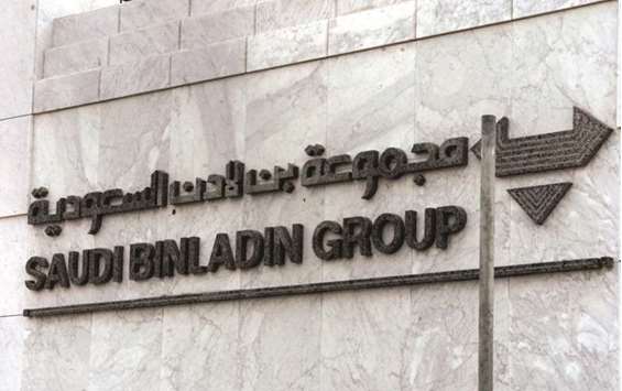 This file photo taken on September 20, 2001 shows the logo of the Saudi Biniadin Group on their headquarters in Jeddah. Binladin, which had over 100,000 employees at its peak, is undergoing the transformation after several members of the Binladin family that owns the company were detained in November as part of an anti-graft purge that ensnared hundreds of business people and government officials.