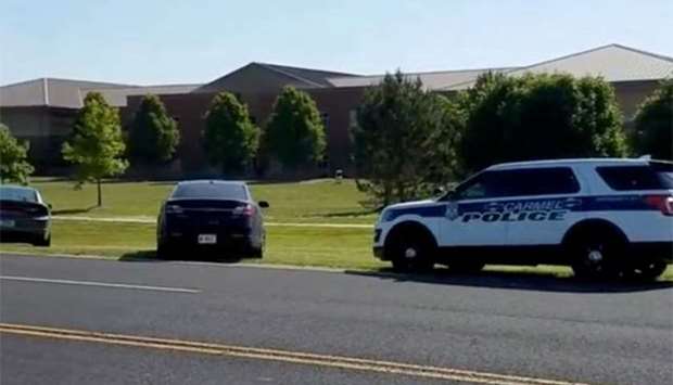 Police are seen near Noblesville West Middle School in Noblesville, Indiana, on Friday.