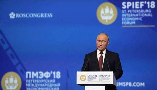 Russian President Vladimir Putin speaking at a session of the Saint Petersburg International Economic Forum in Saint Petersburg on Friday.
