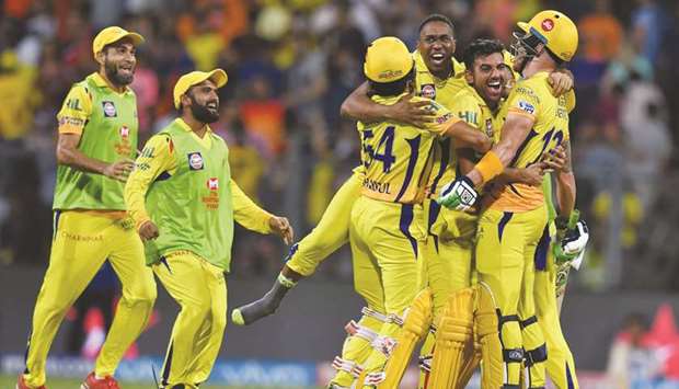Chennai Super Kings cricketers celebrate after winning the 2018 Indian Premier League (IPL) Twenty20 first qualifier cricket match against Sunrisers Hyderabad at the Wankhede stadium in Mumbai on May 22. The IPL is a virtual cash cow whose popularity shows no sign of waning 10 years after its launch.