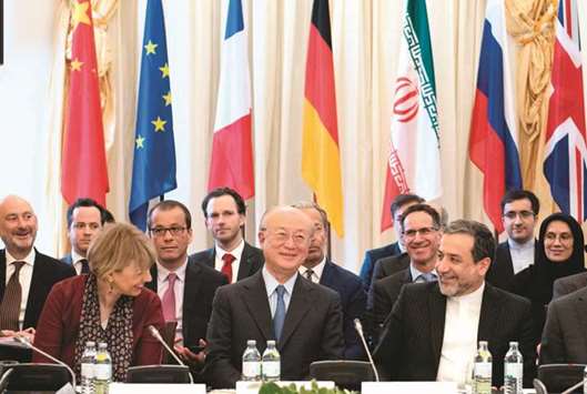 (L to R) Secretary-General of the European Union External Action Service (EEAS) Helga Schmid, Director General of the International Atomic Energy Agency IAEA, Yukiya Amano and political deputy at the Ministry of Foreign Affairs of Iran Abbas Araghchi attend a special meeting of the Joint Commission of parties to the JCPOA on Iranu2019s nuclear deal at Coburg palace in Vienna, yesterday.