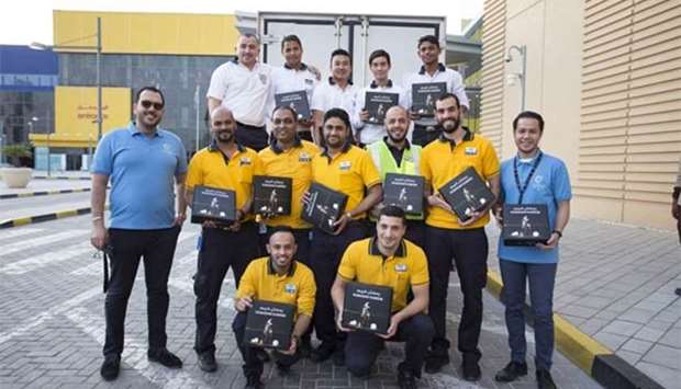 The Doha Festival City team ready with Iftar boxes for distribution.