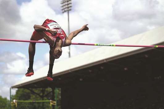 Qataru2019s Mutaz Essa Barshim clears the bar during the menu2019s high jump event at the IAAF Diamond League Prefontaine Classic in Eugene, Oregon, yesterday. Barshim, who had won in the Doha leg of the IAAF Diamond League series earlier this month, won with a 2.36m effort. (Twitter/Diamond_League)