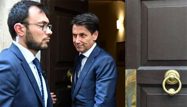 Newly appointed Italy's Prime Minister Giuseppe Conte leaves his house in Rome on Sunday.