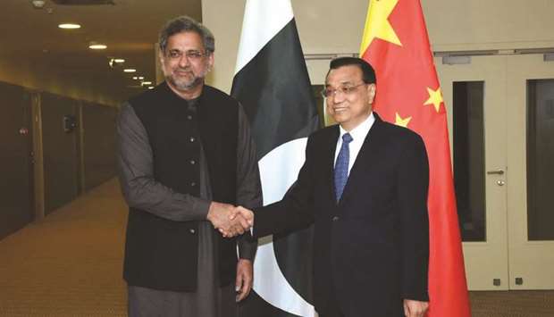 Pakistan Prime Minister Shahid Khaqan Abbasi with his Chinese counterpart Li Keqiang. Lending to Pakistan by China and its banks is on track to hit $5bn in the fiscal year ending in June, according to recent disclosures by officials and Pakistan finance ministry data reviewed by Reuters.
