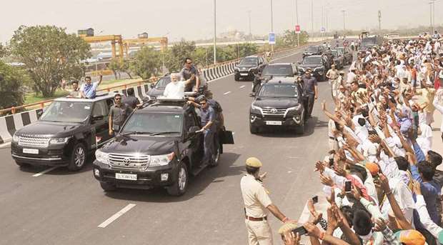 Prime Minister Narendra Modi arrives to inaugurate the first phase of Delhi-Meerut Expressway, in New Delhi, yesterday.
