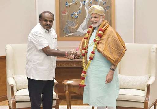 Karnataka Chief Minister H D Kumaraswamy calls on Prime Minister Narendra Modi in New Delhi yesterday.