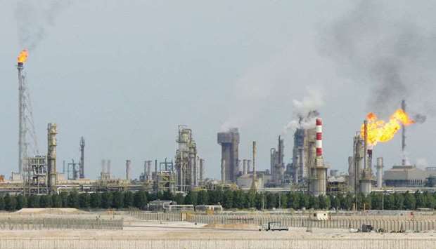 The file photo taken on February 1, 2006 shows an oil refinery on the outskirts of Doha. Higher prices for hydrocarbons, basic metals, refined petroleum products, dairy products and paper products helped the industrial producersu2019 earnings soar in double digits in April, according to MDPS figures.