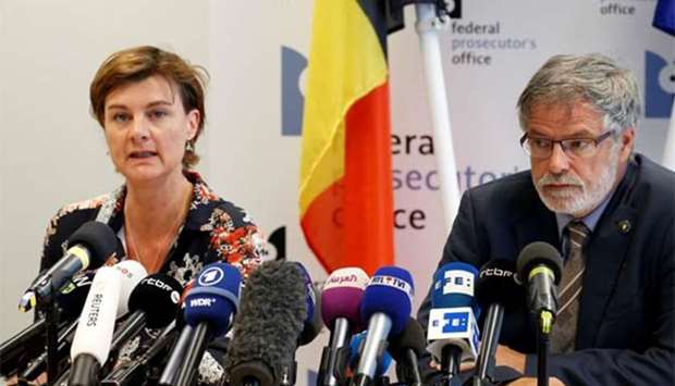 Belgian federal prosecutors Wenke Roggen and Eric Van Der Sypt attend a news conference after the Liege shooting, at the federal prosecutors office in Brussels on Wednesday.