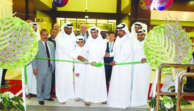 Al Meera officials and other dignitaries during the opening of the company's second branch in Azghawa.