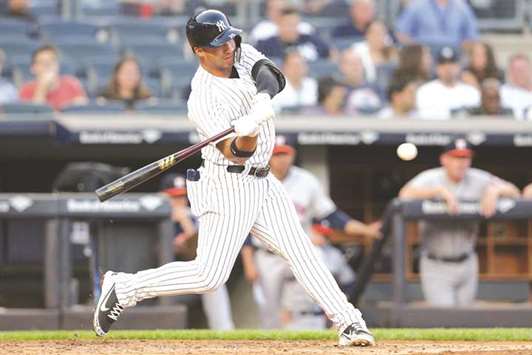 New York Yankees second baseman Gleyber Torres hits an RBI single against the Houston Astros during the second inning at Yankee Stadium. PICTURE: USA TODAY Sports