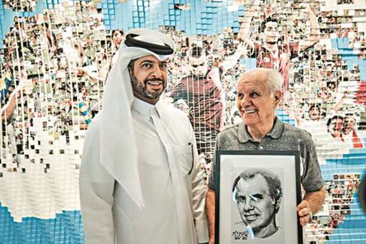 Evaristo de Macedo (right), who coached the Qatar team for 1981 FIFA World Youth Championship in Australia, with Nasser al-Khater, the Supreme Committee for Delivery & Legacyu2019s (SC) Assistant Secretary General for Tournament Affairs, at the SCu2019s Legacy Pavilion in Doha.