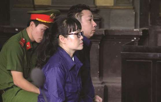 Former VietinBanku2019s official Huynh Thi Huyen Nhu is seen during her appeal trial at a court in Ho Chi Minh city yesterday.