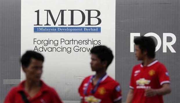 A 1 Malaysia Development Berhad (1MDB) billboard is seen in Kuala Lumpur.