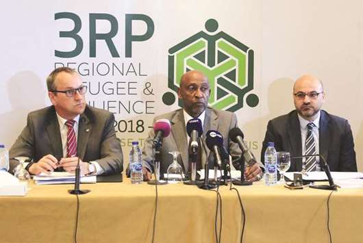 Amin Awad (centre), UNHCR Director for the Middle East and North Africa, Geert Cappelaere (left), Unicef Regional Director for the Middle East and North Africa, and Samuel Rizk, manager, Sub-Regional Response Facility, UNDP Arab States, attend a news conference in Amman yesterday.