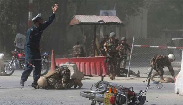 Afghan security forces are seen at the site of a blast in Kabul earlier this week.