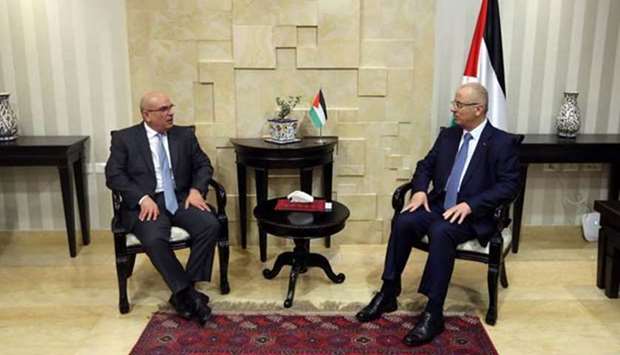 Palestinian Prime Minister Rami Hamdallah meets Ambassador Mohamed Ismail al-Emadi. 