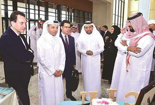 HE the Minister of Education and Higher Education Dr Mohamed Abdul Wahed Ali al-Hammadi tours the QU event along with French ambassador Eric Chevallier and QU president Dr Hassan al-Derham.