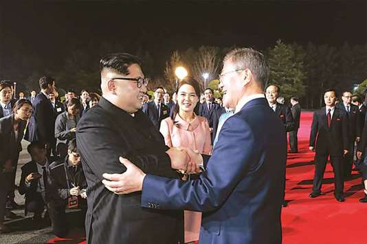 North Koreau2019s leader Kim Jong-un and South Koreau2019s President Moon Jae-in bidding farewell during a closing ceremony of the inter-Korean summit on April 27 in the truce village of Panmunjom.