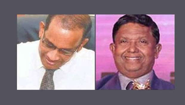 Officials of the Commission to Investigate Allegations of Bribery arrested I.H.K. Mahanama(Left), the president's chief of staff, and P. Dissanayake, the head of the State Timber Corporation.