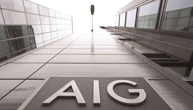 A logo is displayed on a sign outside the headquarters of AIG Europe in London. AIG, Lloydu2019s of London, Allianz and other insurers are ignoring assurances and establishing new hubs in Britain and the European Union before Brexit in March 2019 to ensure access to customers.