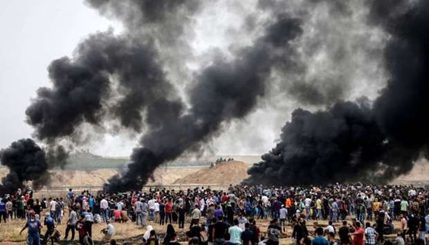 A picture taken Friday from the border with Israel in the northern Gaza strip east of Gaza City shows a general view of a clashes between Palestinians and Israeli forces following the sixth straight Friday of mass demonstrations calling for the right to return to their historic homelands.
