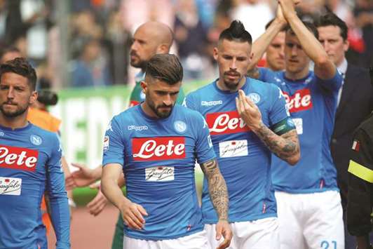 Napoli players are dejected after they were held to a draw by Torino in the Serie A at the Stadio San Paolo stadium in Naples, Italy, yesterday. (Reuters)