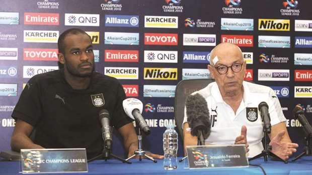 Al Sadd coach Jesualdo Ferreira (right) speaks at a press conference as player Abdul Karim Hassan looks on on the eve of the first leg of the AFC Champions League Round of 16 tie against Saudi Arabiau2019s Al Ahli yesterday. PICTURE: Shemeer Rasheed