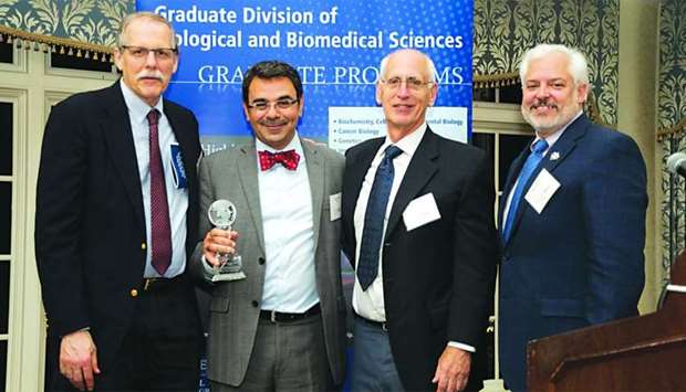 Dr Khaled Machaca (second left) after receiving the Distinguished Alumnus of the Year Award from Emory Universityu2019s Graduate Division of Biological and Biomedical Sciences.