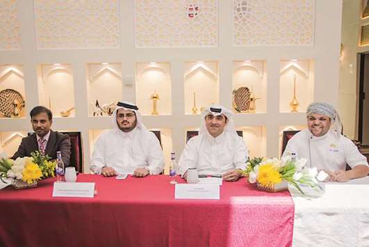 Officials at the opening of the first restaurant at Msheireb Downtown Doha.