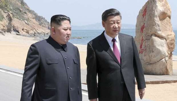 Chinese President Xi Jinping and North Korean leader Kim Jong Un meet in Dalian