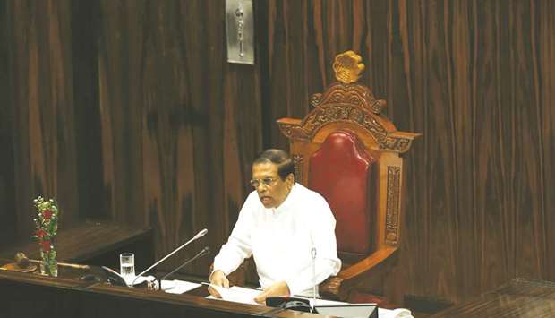 President Maithripala Sirisena announces a policy statement during a ceremony for the new session of parliament in Colombo yesterday.