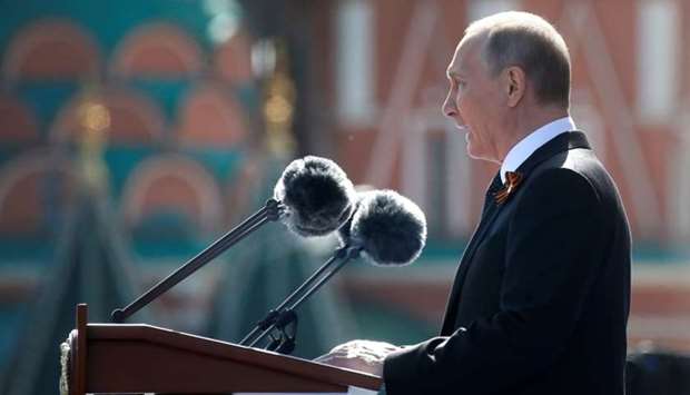 Russian President Vladimir Putin delivers a speech during the Victory Day parade, marking the 73rd anniversary of the victory over Nazi Germany in World War Two, at Red Square in Moscow, Russia.