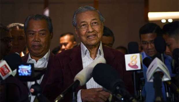 Former Malaysian prime minister and opposition's candidate Mahathir Mohamad speaks to the media following the 14th general elections in Kuala Lumpur on Wednesday.