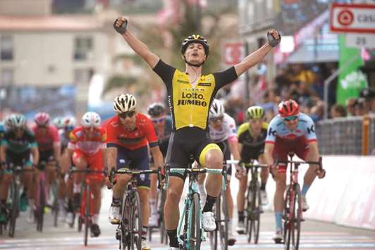 Italyu2019s rider of team Lotto-Jumbo Enrico Battaglin celebrates after winning the fifth stage during the 101st Giro du2019Italia. (AFP)