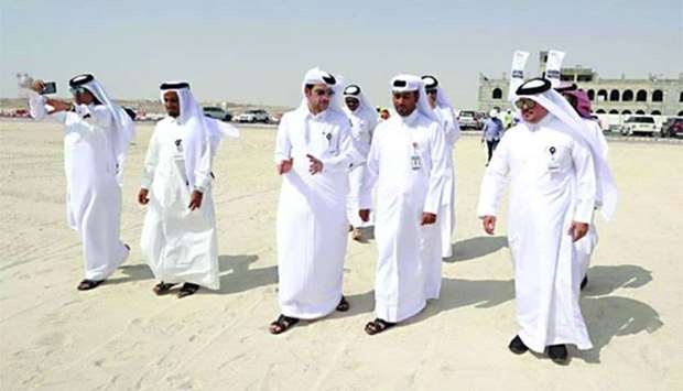 Engineer Abdul Aziz al-Mansouri and other officials on a tour of inspection of the renovated zones of Wakrah beach.